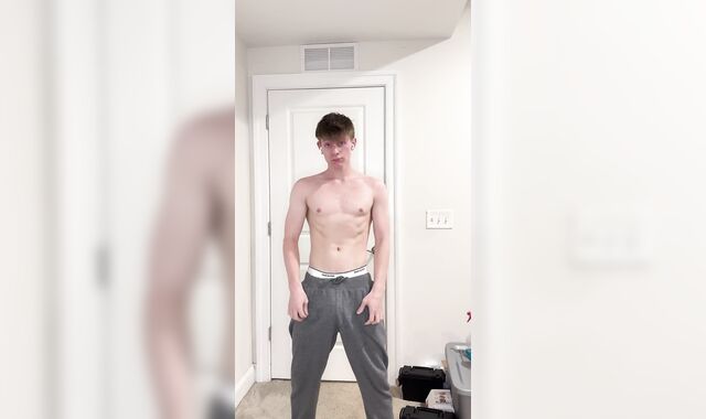 Draped Youngster Unsheathes Humungous Man-meat Under Gray Sweatpants