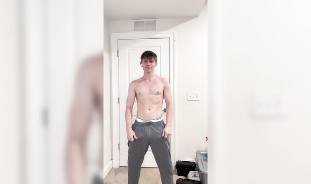 Draped Youngster Unsheathes Humungous Man-meat Under Gray Sweatpants