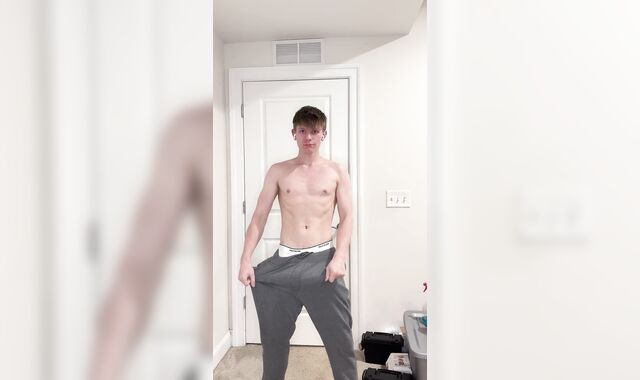 Draped Youngster Unsheathes Humungous Man-meat Under Gray Sweatpants