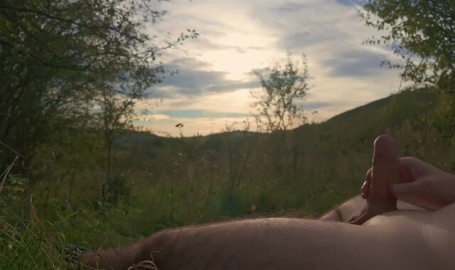 Lazy jack off in nature to the sunset