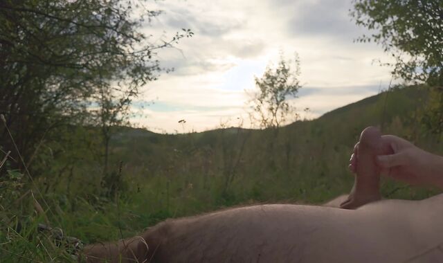 Lazy jack off in nature to the sunset
