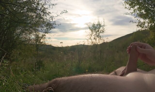 Lazy jack off in nature to the sunset