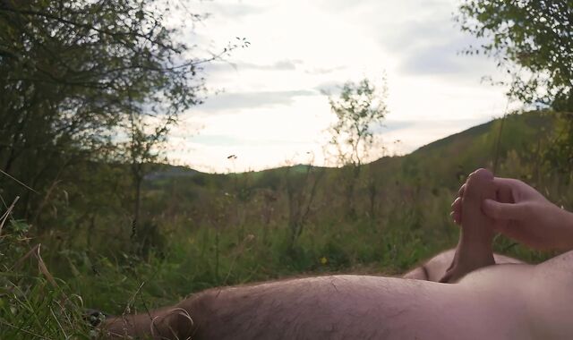 Lazy jack off in nature to the sunset