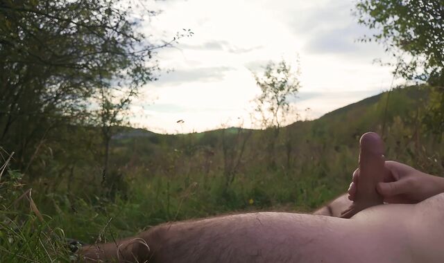 Lazy jack off in nature to the sunset
