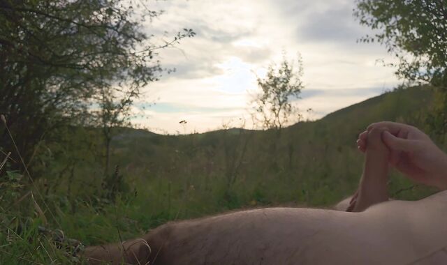 Lazy jack off in nature to the sunset