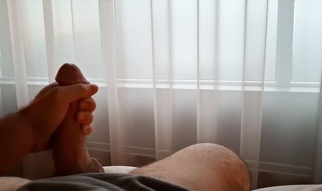 Wild Parent Is Nearly Caught As He Faps Off By Open Window