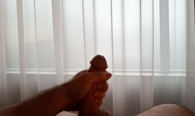 Wild Parent Is Nearly Caught As He Faps Off By Open Window