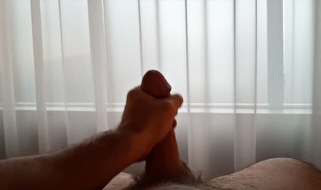 Wild Parent Is Nearly Caught As He Faps Off By Open Window