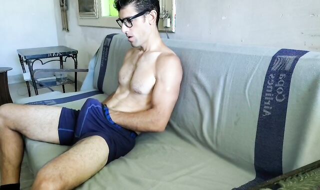 Nerdy Klaus Joe peels off and jacks his rock hard penis