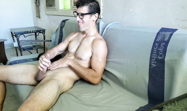 Nerdy Klaus Joe peels off and jacks his rock hard penis