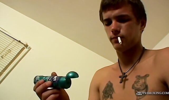 BoysSmoking: Mighty smoker Cain fires his ciggie and begins jerking his pulsating cock