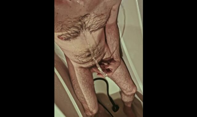 Fur covered uncircumcised boy urinates on himself and in his jaws, tastes his own urinate in the shower