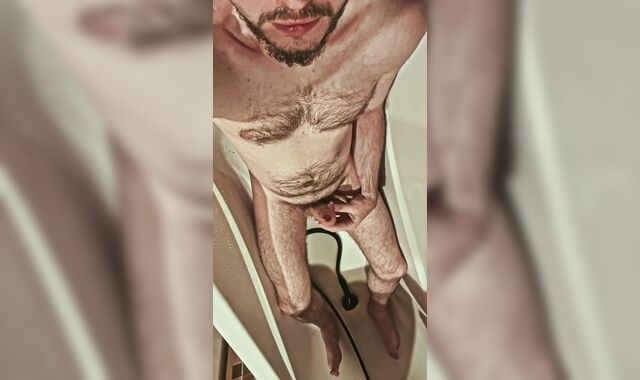 Fur covered uncircumcised boy urinates on himself and in his jaws, tastes his own urinate in the shower