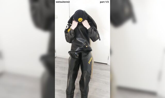 Putting on powerful protection Viking drysuit, gasmask, spandex mask and rubber