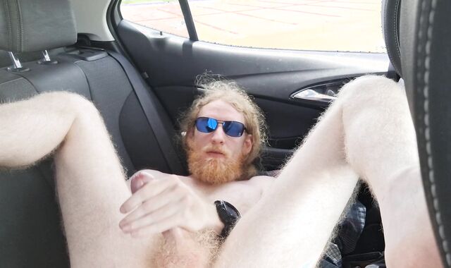 Perspiring ginger in camper is too steamy for his clothes and jerks off nude