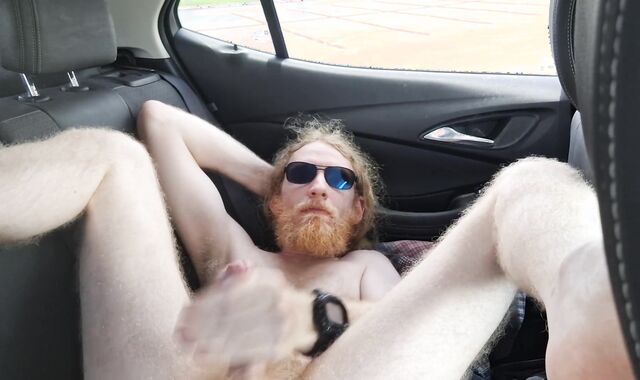 Perspiring ginger in camper is too steamy for his clothes and jerks off nude