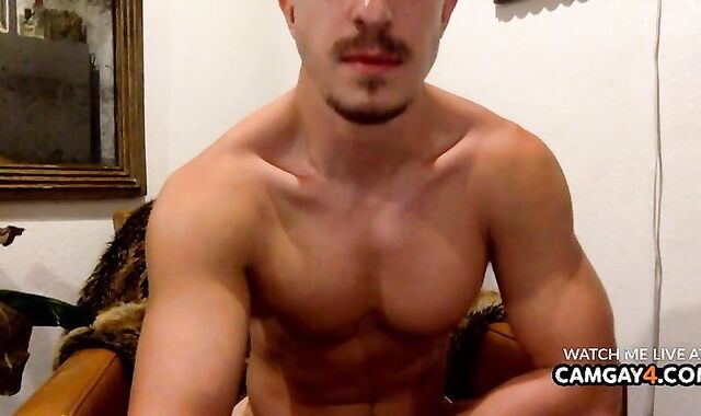 brawny dude Massaging His wood