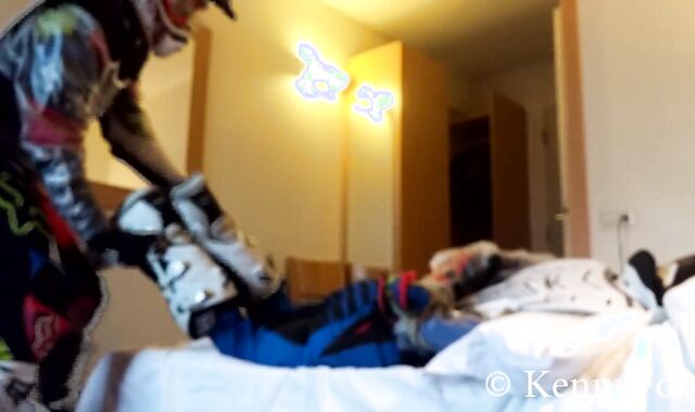 Ficht in motocross gear over who is going to be the bottom