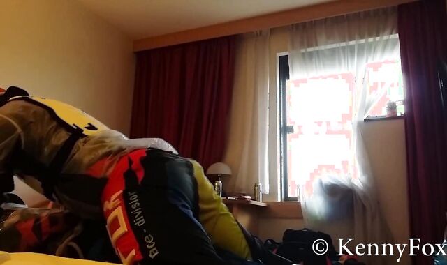 Ficht in motocross gear over who is going to be the bottom