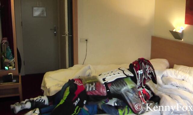 Ficht in motocross gear over who is going to be the bottom