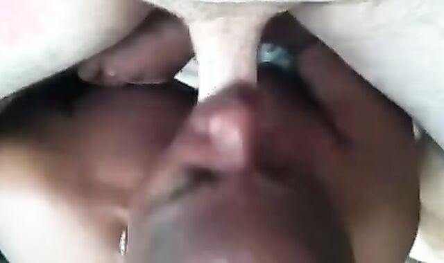 Black dude vigorously sucks a white dick